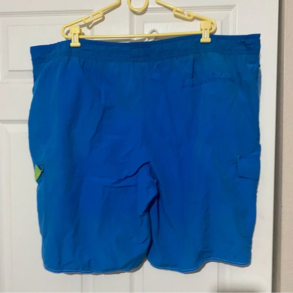Men’s The Foundry Supply Co blue with green swim trunks. 3XL